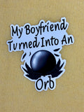 Sticker with text 'My Boyfriend Turned Into An Orb' on a beige background