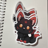 Several black and red kitsune stickers on a white background